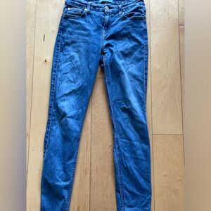7 for all Mankind low rise medium wash jeans. Size 26.